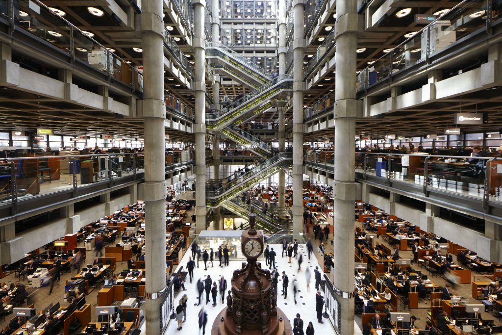 Lloyd's Underwriters gathered in the Lloyd's of London building
